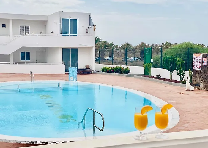 Canaryislandshost I Amanecer كوستا تاغيسي